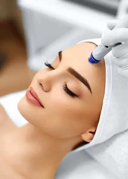 Woman getting skin rejuvenation treatment